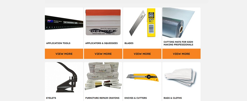 Sign making tools including blades, squeegees, cutters, and application supplies used in Thomastown workshop