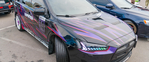 Vehicle wrapped with custom printed and cut vinyl graphics for automotive signage in Melbourne