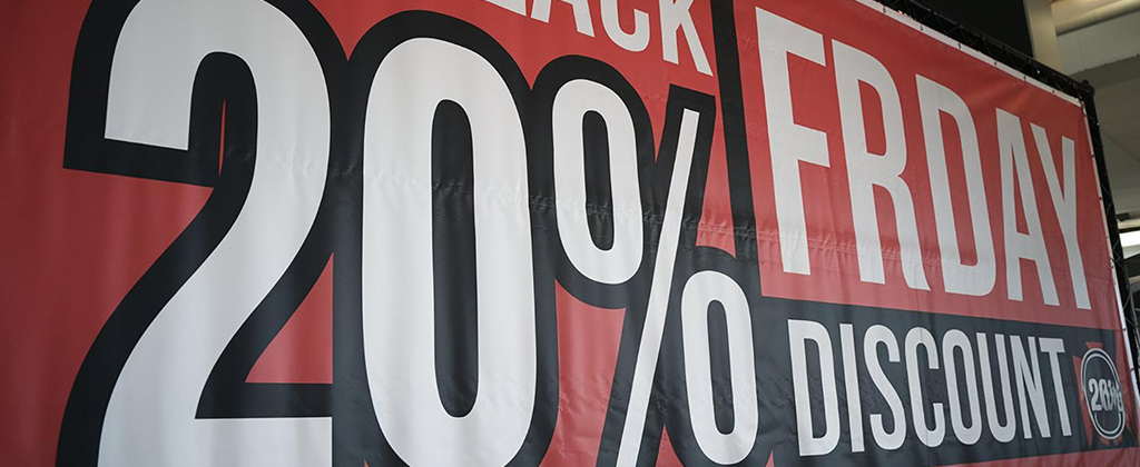 Choosing the Right Signage Vinyl for Your Project Requirements – Bi-Wize Melbourne Large outdoor vinyl banner signage installed on a building exterior demonstrating long-term durability and weather resistance in Melbourne